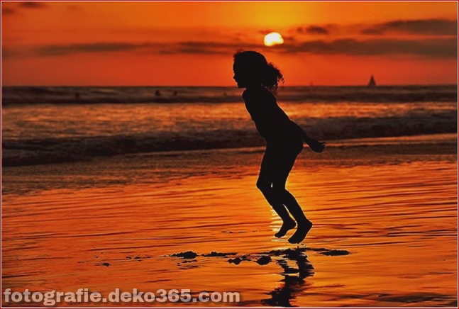 Girl Jumping for Joy at Sunset in Oceanside